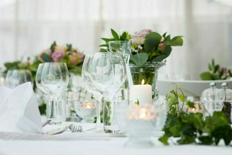 clear long-stem wine glasses on table